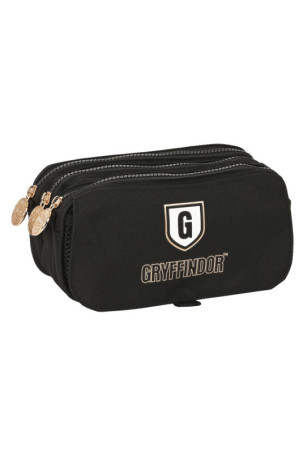 Trigubas penalas Harry...